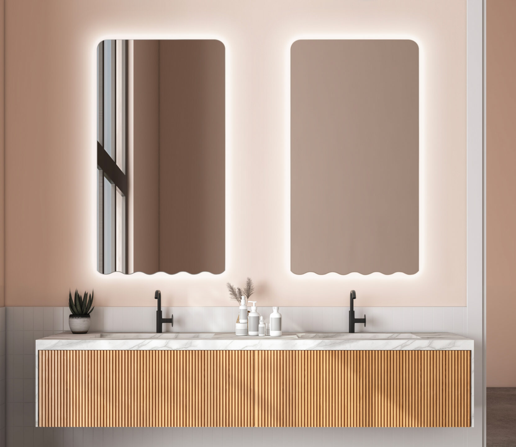 dwa lustra nad umywalką w różowej łazience